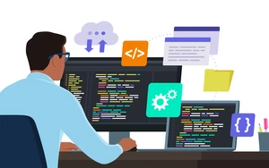 Man sitting in front of a PC and coding