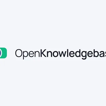 The OpenKnowledgebase logo: a violet circle overlapping a green rounded block, beside the wordmark "OpenKnowledgebase".
